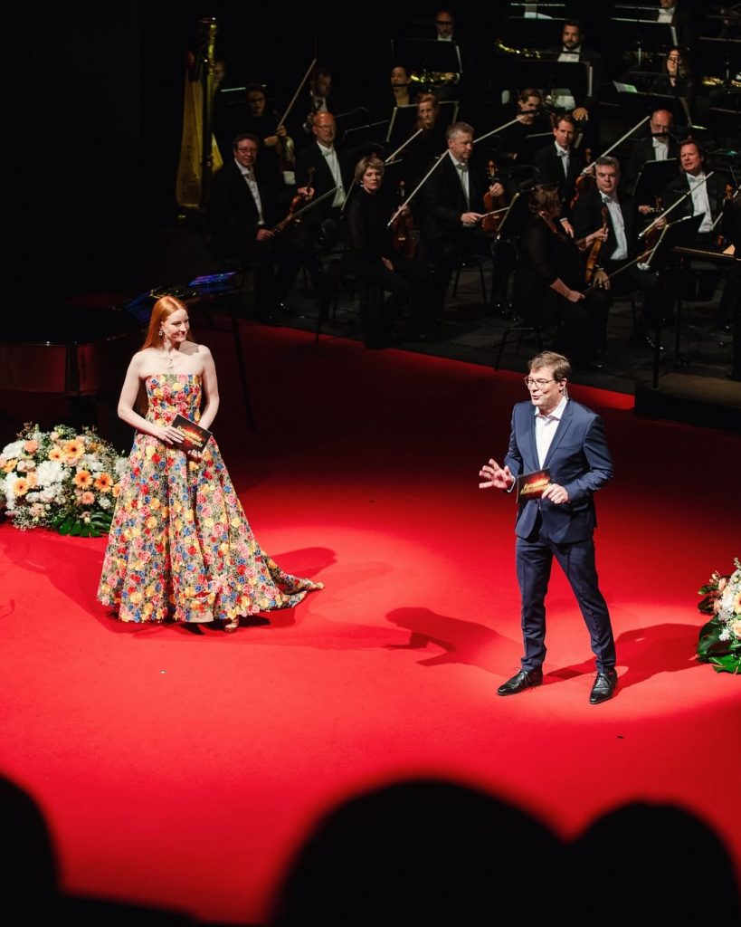 Barbara Meier in a vibrant floral dress at the Europäischen Kulturpreis