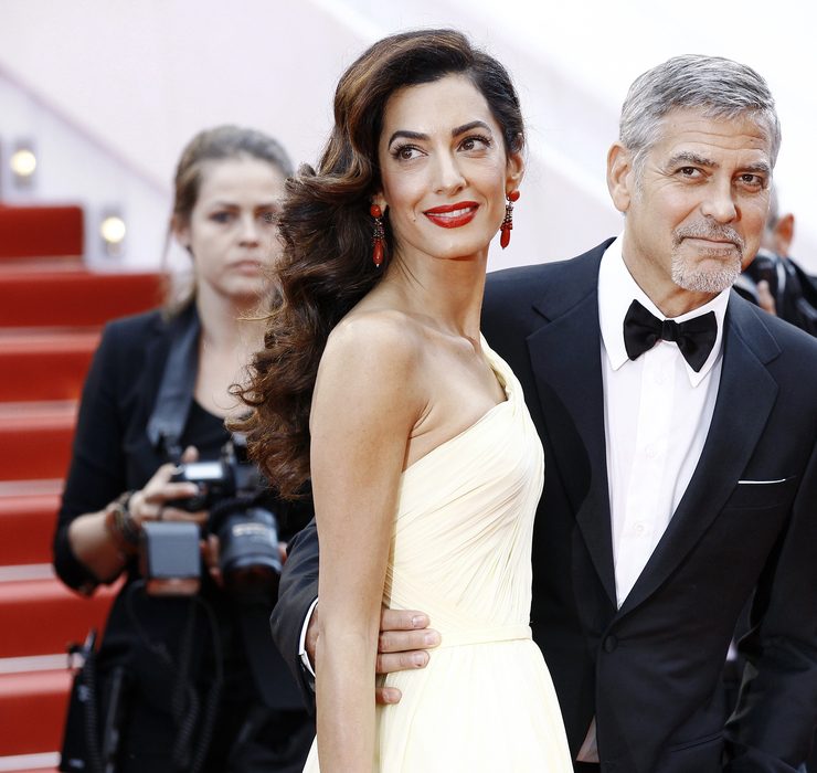 A striking entrance: Amal and George Clooney on the red carpet in London