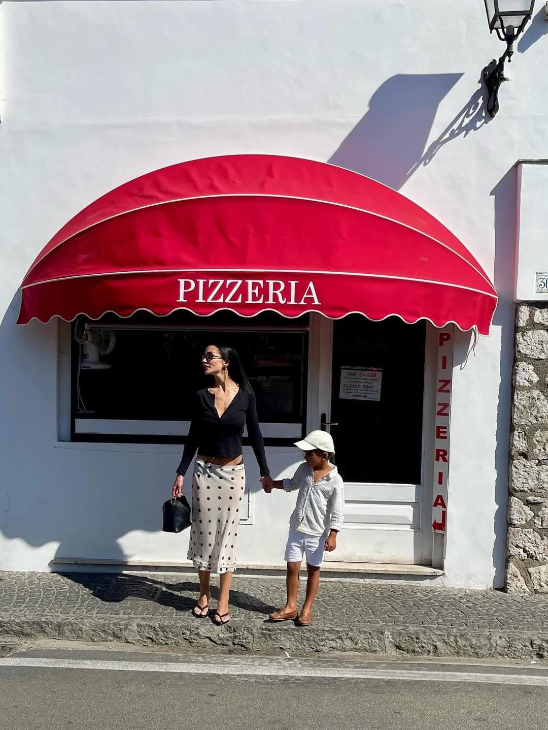 Family getaway: Ed Westwick enjoys a holiday on Capri with his wife and children