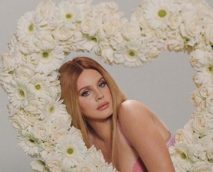 Hand in Hand with Her Love: Lana Del Rey at the Valentino Show in Paris