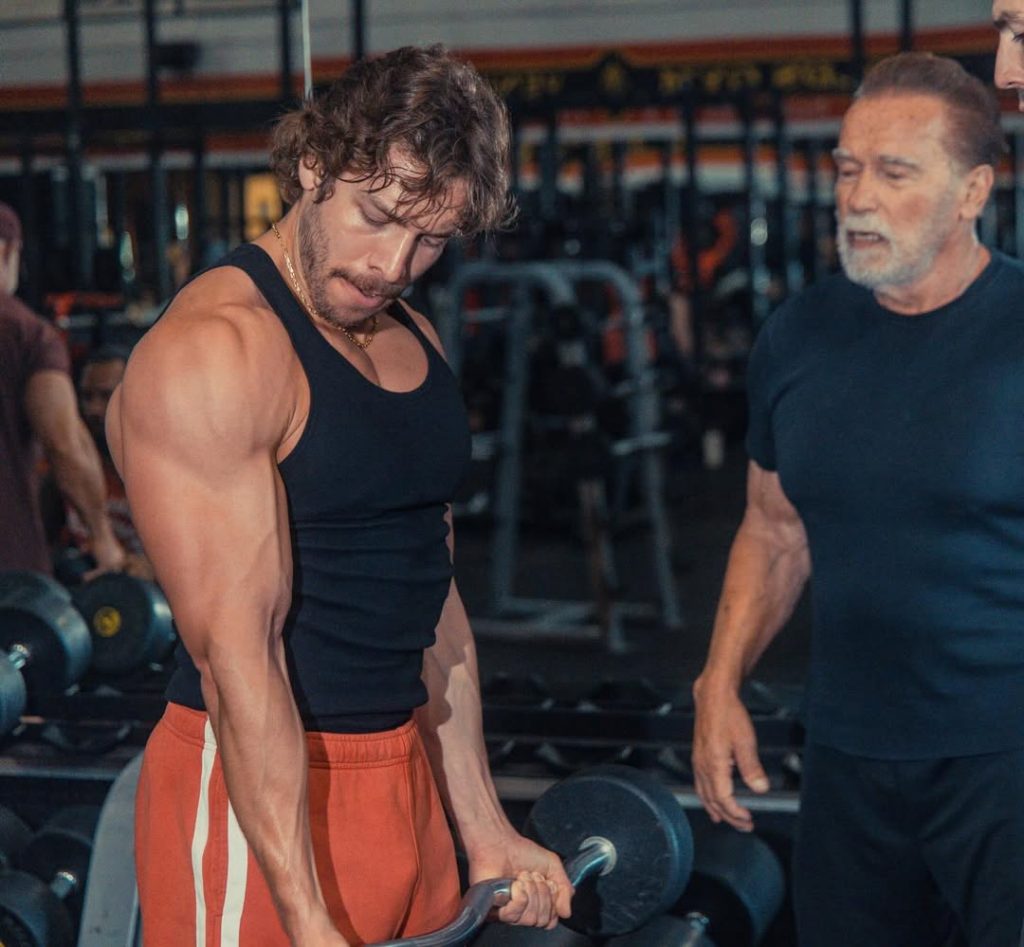 Arnold Schwarzenegger prepares his son for a bodybuilding debut